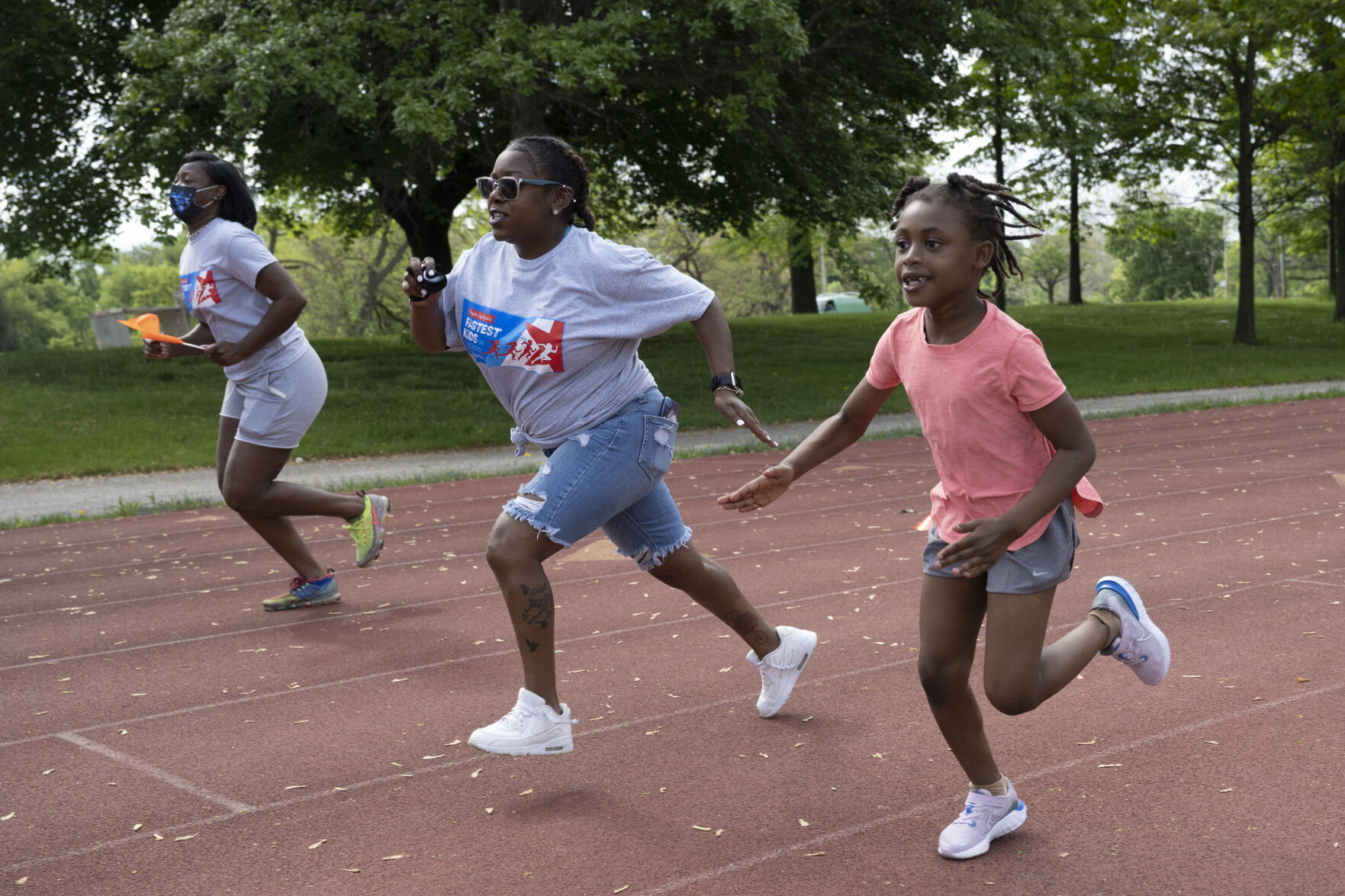Photo: Young runners race in Jackson Park as part of city track program